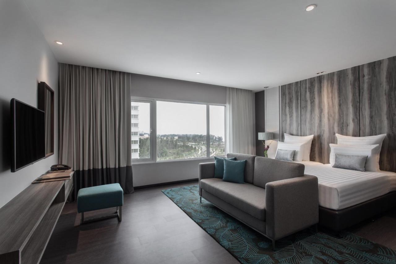 Hotel Pullman Miri Waterfront Exterior foto Deluxe Room